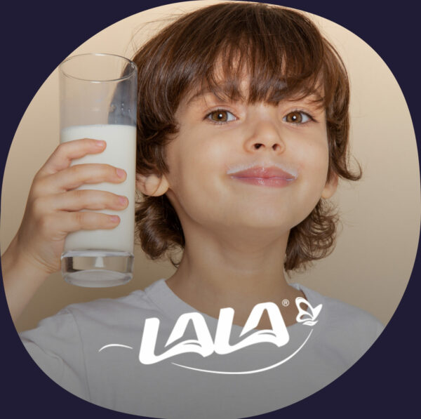 A child drinking milk, showcasing dairy products and nutrition.